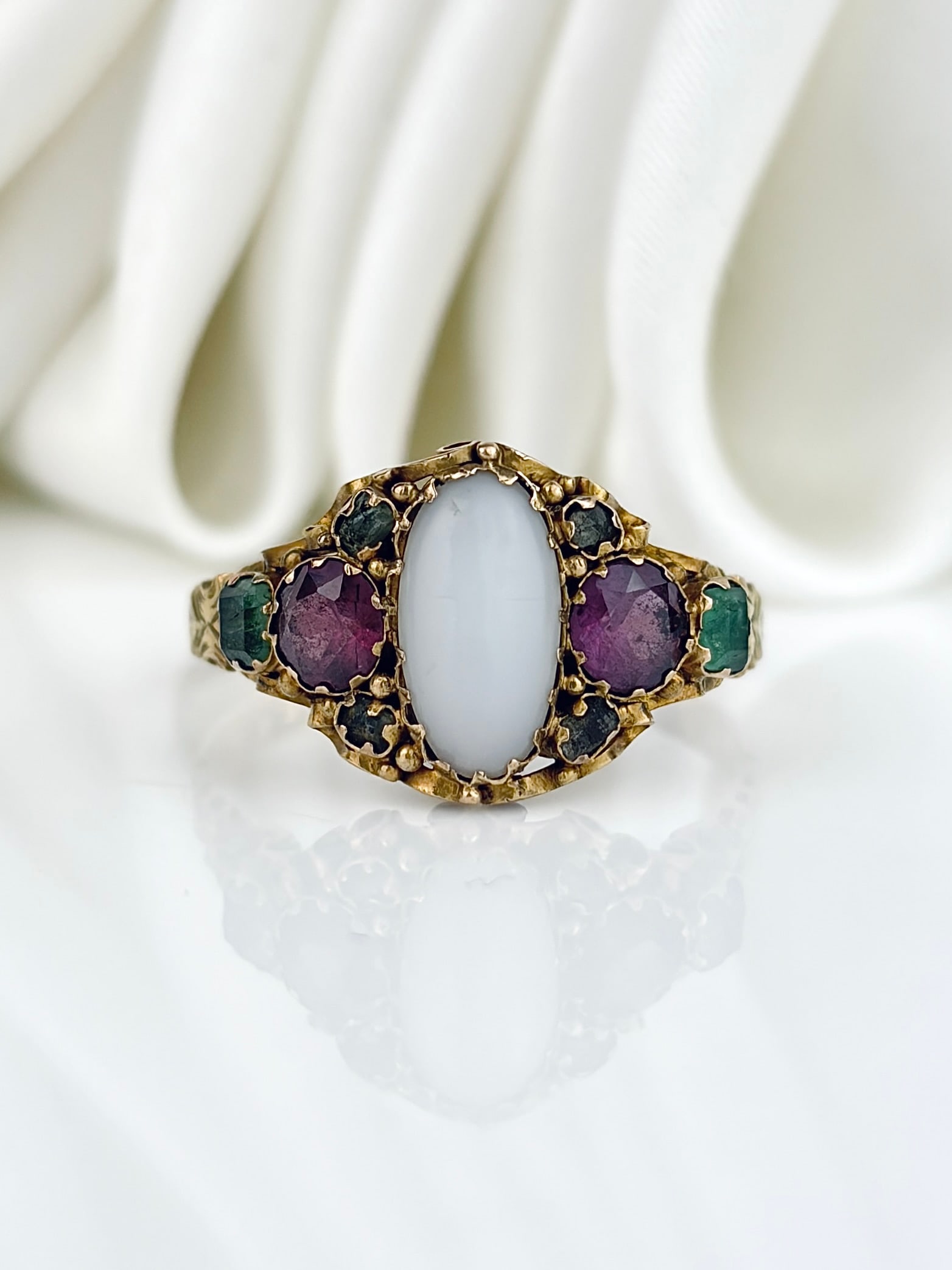 Antique c.1873 15ct Yellow Gold Opal, Amethyst and Emerald Ring: Antique c.1873 15ct Yellow Gold Opal, Amethyst and Emerald Ring Gorgeous ring from the Victorian era, with a central opal, engraved details and the sweetest amethysts and emeralds!