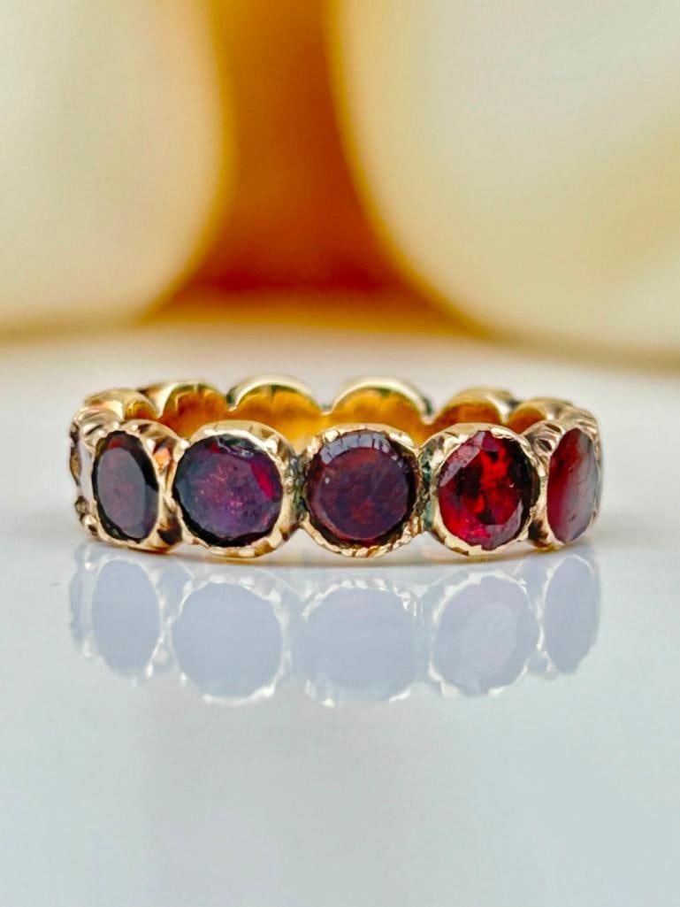 Georgian Era Flat Cut Garnet Full Hoop / Eternity Band Ring in Gold: Georgian Era Flat Cut Garnet Full Hoop / Eternity Band Ring in Gold the most gorgeous flowing garnet eternity!! measurements size UK M1/2 US 61/2 band width 4mm weight 2.28g