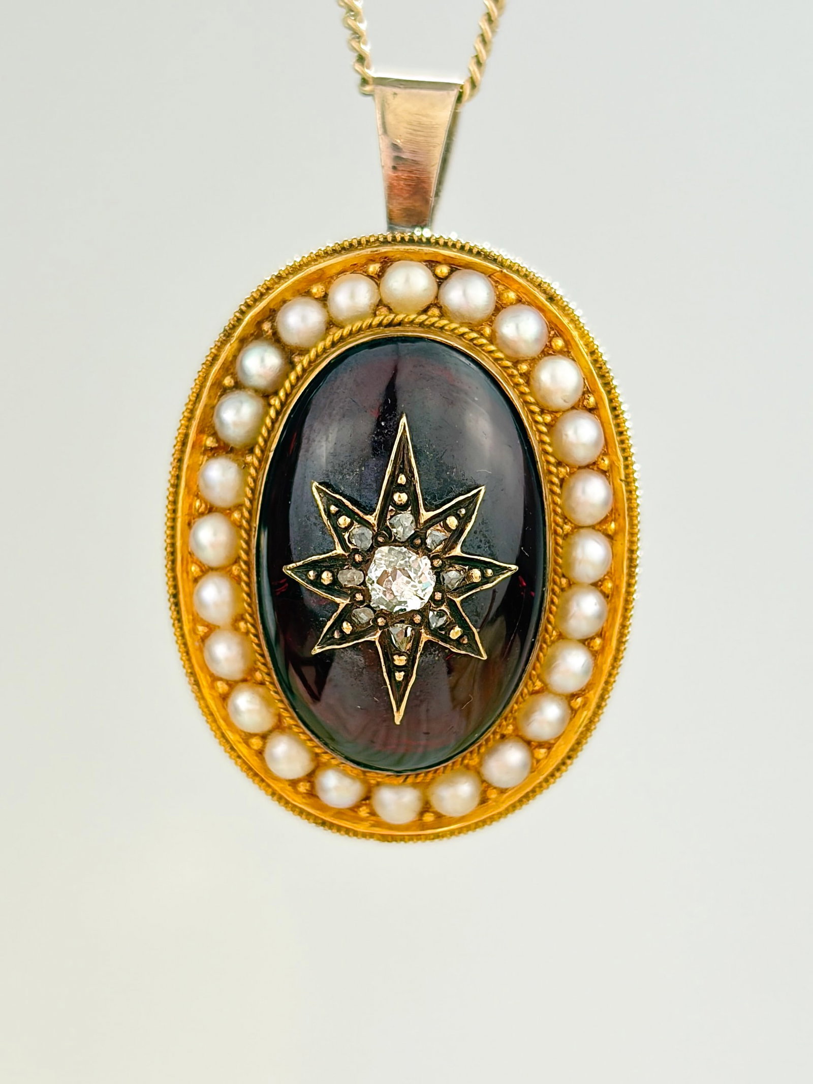 Antique Victorian Cabochon Garnet with Inset Diamond Star and Pearl Surround Pendant in Gold: Antique Victorian Cabochon Garnet with Inset Diamond Star and Pearl Surround Pendant in Gold Amazing pendant with a juicy cabochon garnet and a beautiful inlaid diamond star!
