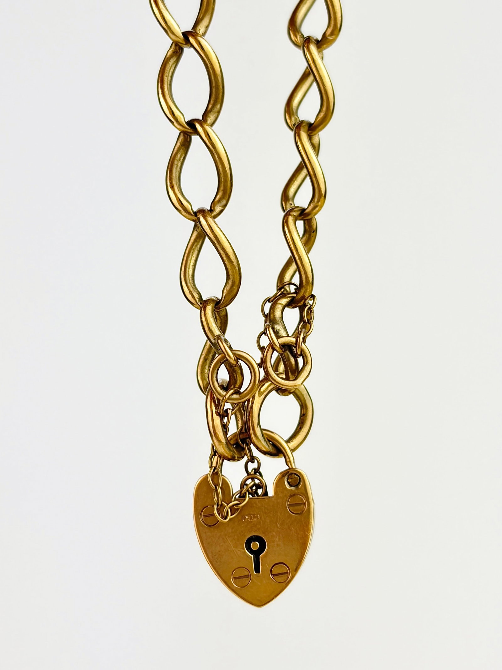 Antique 9ct yellow gold open link curb bracelet with heart padlock (1 of 7)