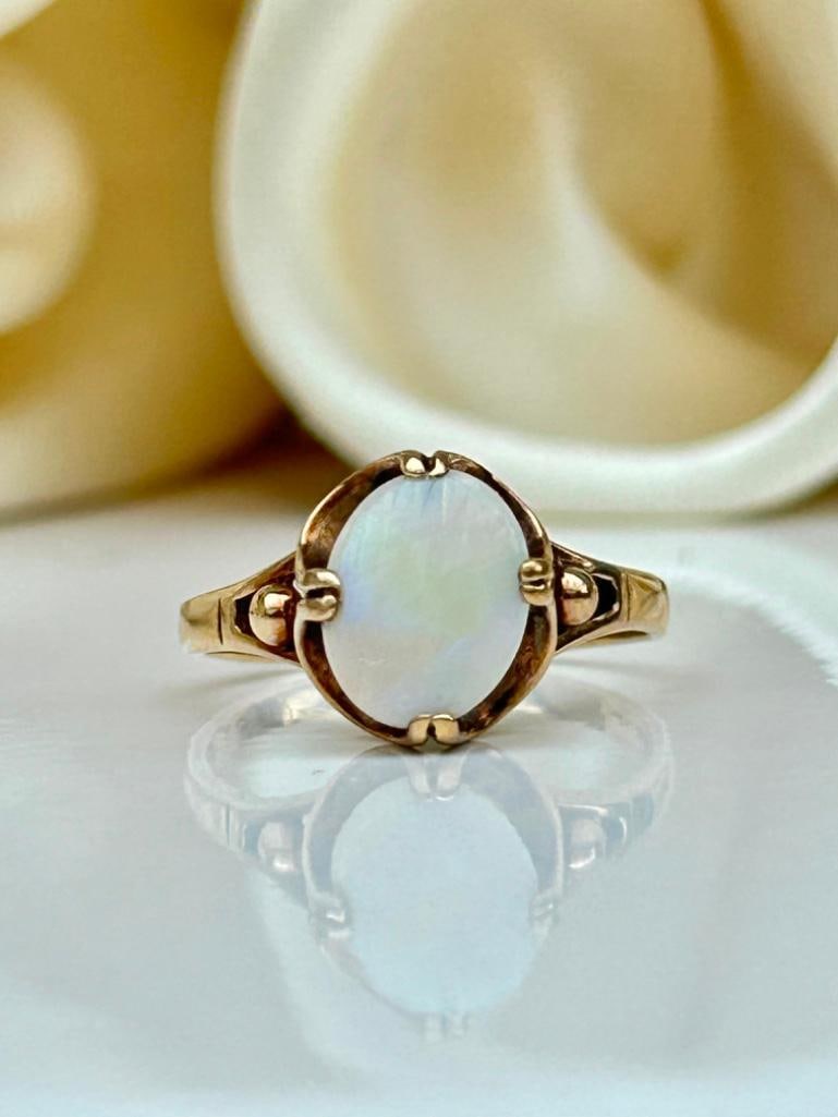 9ct Gold Opal Ring: 9ct Gold Opal Ring a wonderful opal ring! measurements size UK P1/2 US 8 head of ring 10mm x 9mm weight 2.36g stamped 375 materials 9ct gold and