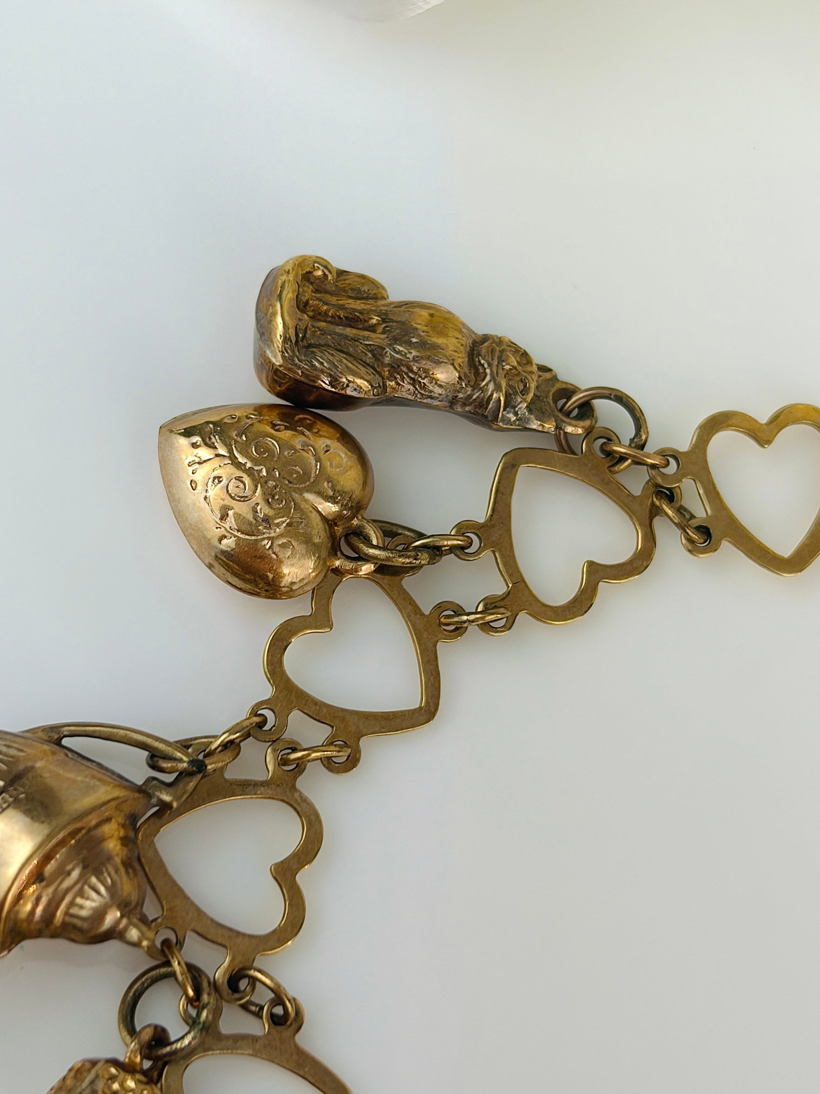 vintage hearts bracelet full of charms all in 9ct gold - 3