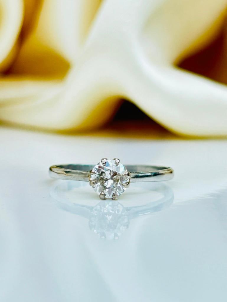 Diamond Solitaire Ring Approx 60pts: Diamond Solitaire Ring Approx 60pts simple yet beautiful engagement style ring measurements size UK N US 7 head of ring 5mm x 5mm weight 2.33g ma