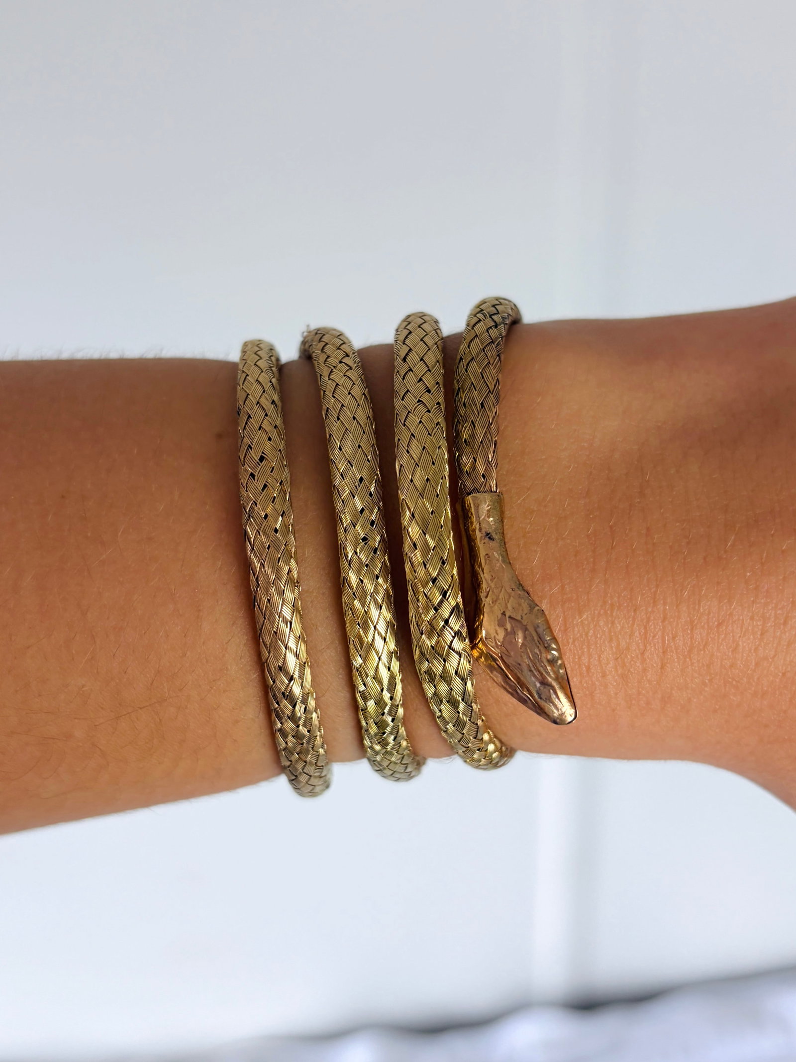 Coiled Snake Bangle in Gilt Metal - 9
