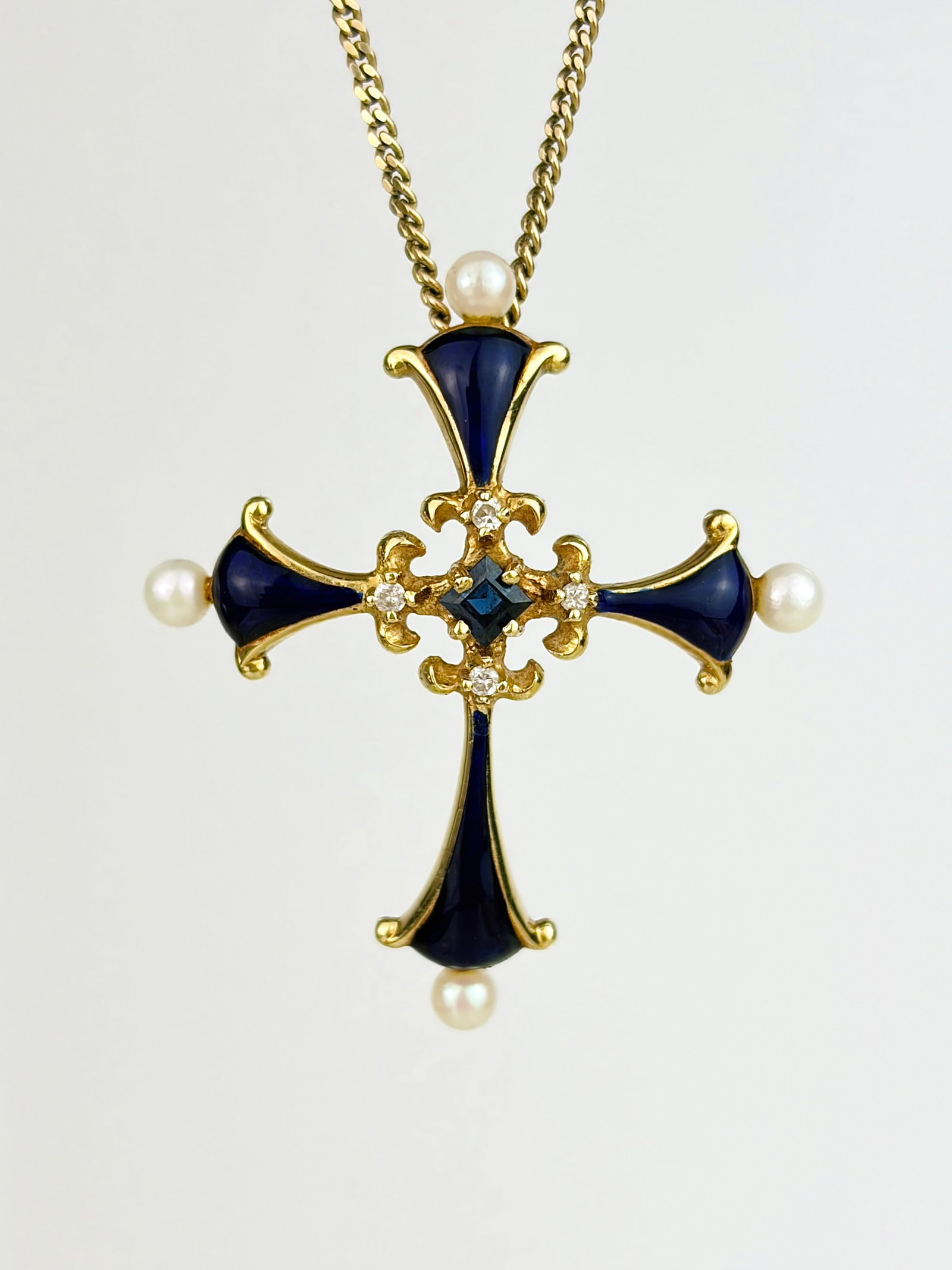 14k Yellow Gold Fabergé Sapphire, Pearl and Blue Enamel Cross Pendant: 14k Yellow Gold Fabergé Sapphire, Pearl and Blue Enamel Cross Pendant A stunning, timeless creation from Fabergé!