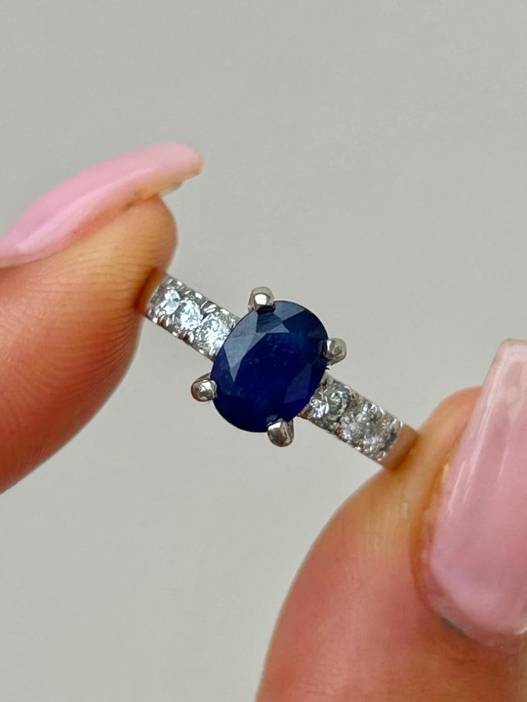 Wonderful Heavy Platinum Sapphire Ring with Diamond Shoulders: Wonderful Heavy Platinum Sapphire Ring with Diamond Shoulders the most beautiful sapphire stone with sweet diamond shoulders measurements size UK L US 6 head of ring 18
