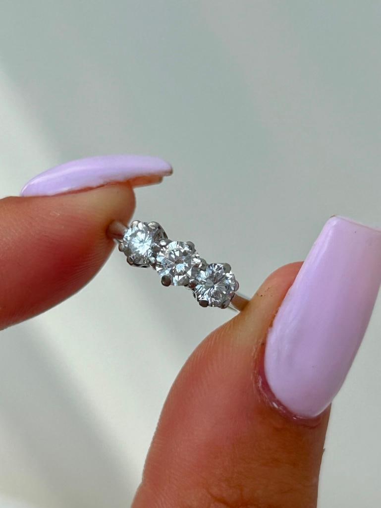 Platinum and Diamond 3 Stone Ring: Platinum and Diamond 3 Stone Ring 1.10ct / h colour / vs2 clarity measurements size UK I US 43/4 head of ring 12mm x 5mm weight 4.13g stamped 950 