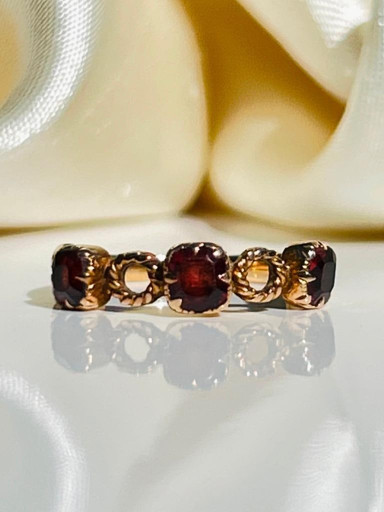 Antique 9CT gold Victorian Garnet half hoop Ring: Antique 9CT gold Victorian Garnet half hoop Ring the sweetest ring measurements size UK N 1/2 US 7 head of ring 19mm x 4mm weight 1.94g materials 9ct gold and garnet
