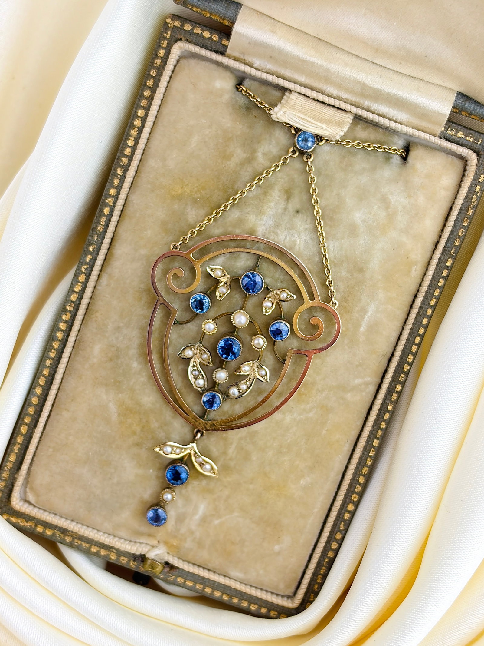 Antique Boxed 9ct Yellow Gold Pretty Sapphire and Pearl Ornate Necklace: Antique Boxed 9ct Yellow Gold Pretty Sapphire and Pearl Ornate Necklace A gorgeous antique necklace perfectly preserved in its original box, covered in pretty pearls and sapphire's! Weight: 5g