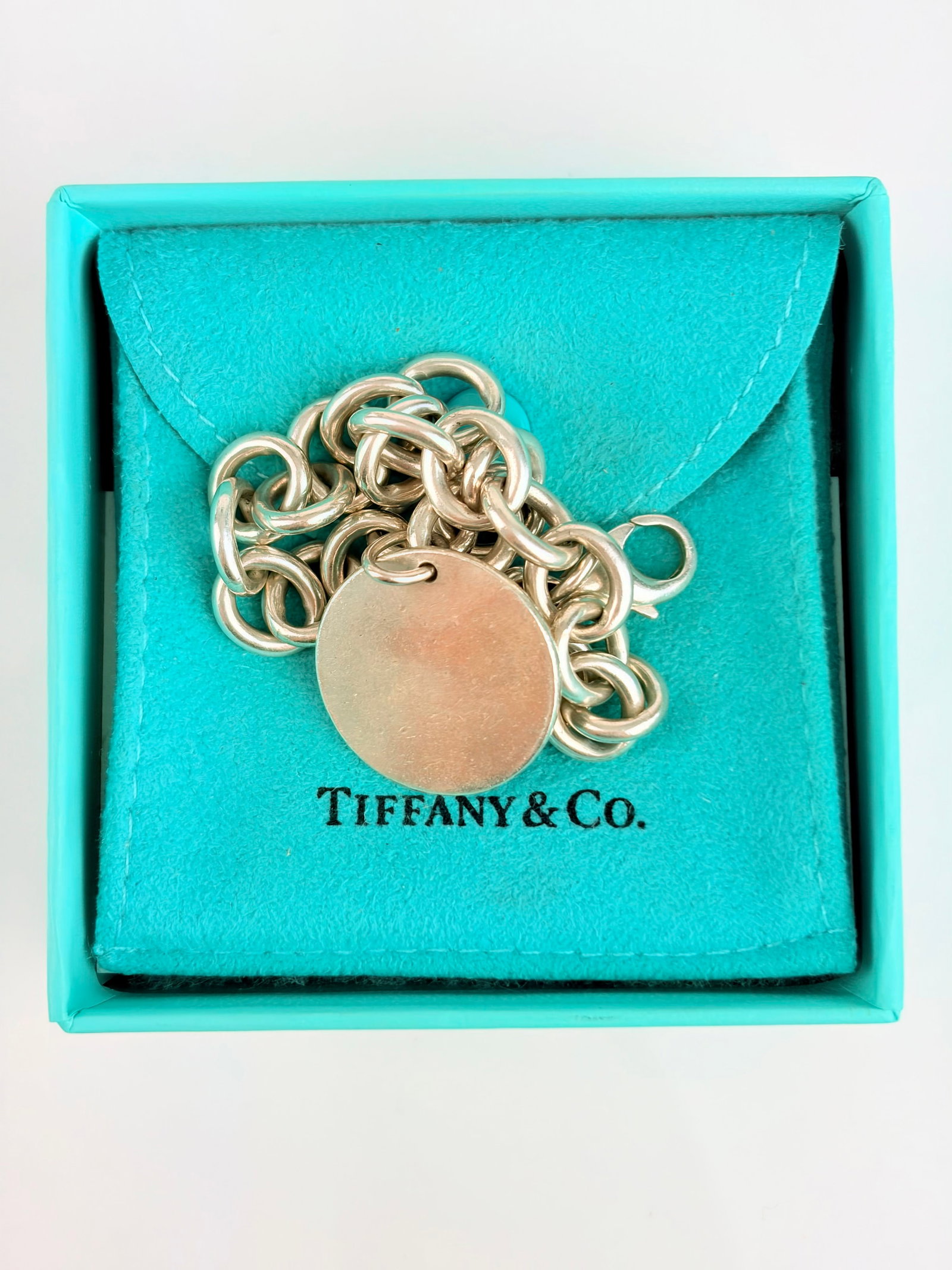 Tiffany & Co Sterling Silver 'Return to Tiffany' Circular Link Bracelet with Box and Pouch: Tiffany & Co Sterling Silver 'Return to Tiffany' Circular Link Bracelet with Box and Pouch Weight 34g Length 21cm, link width 9mm Hallmarked Tiffany&co 925 Office use: uzz