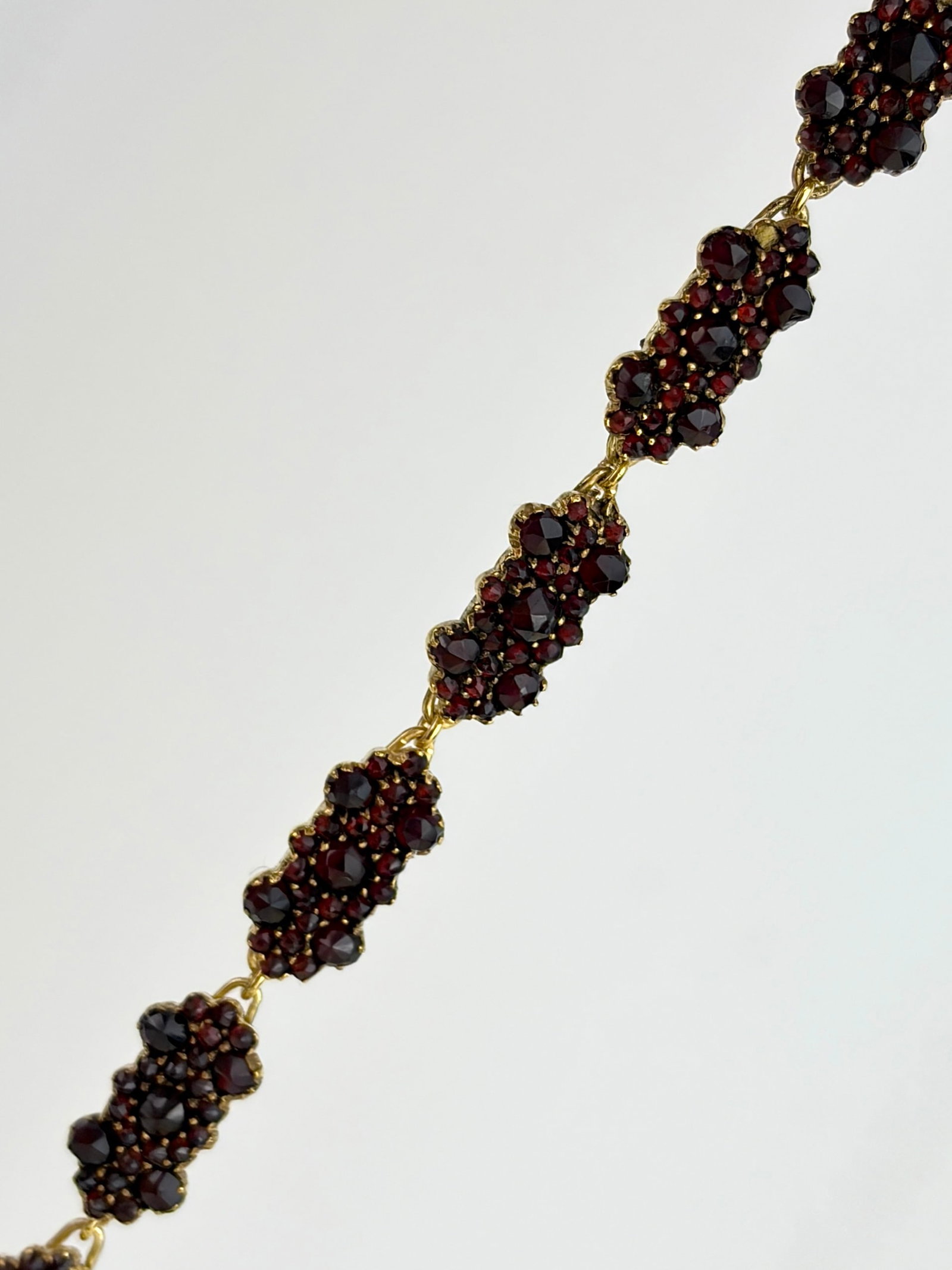 Antique Gilt Metal Bohemian Garnet Bracelet: Antique Gilt Metal Bohemian Garnet Bracelet Weight: 10.7g Size: 17.3cm, width 8mm Materials: gilt metal, garnet Hallmarks: none present Condition: very good overall condition. Some signs