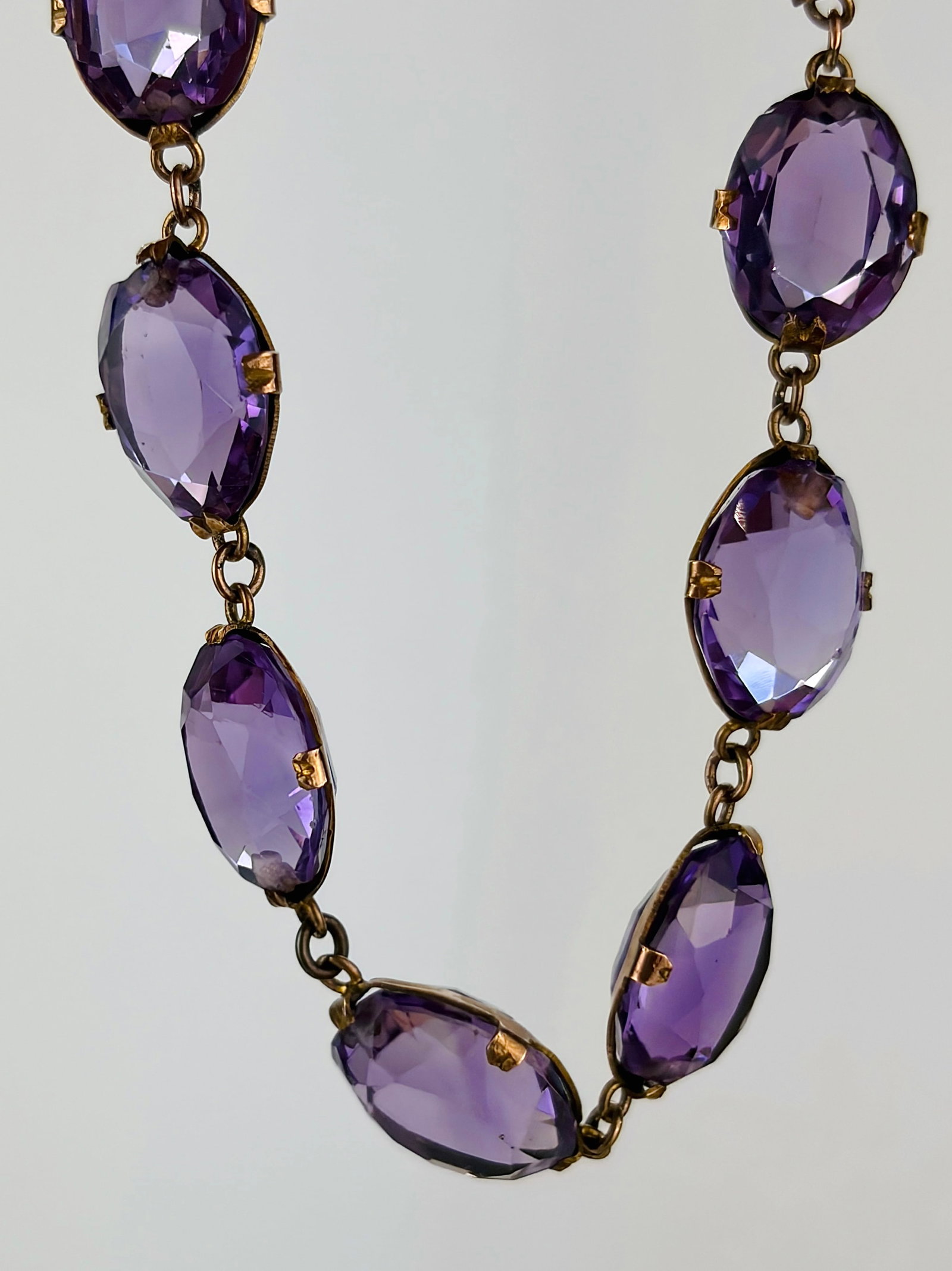 Chunky Victorian Amethyst and 9ct Gold Bracelet with safety chain: Chunky Victorian Amethyst and 9ct Gold Bracelet with safety chain Such a decorative piece! This bracelet is made up of ten amethyst stones. The stones are a lovely purple colour. Modelled in 9 carat g
