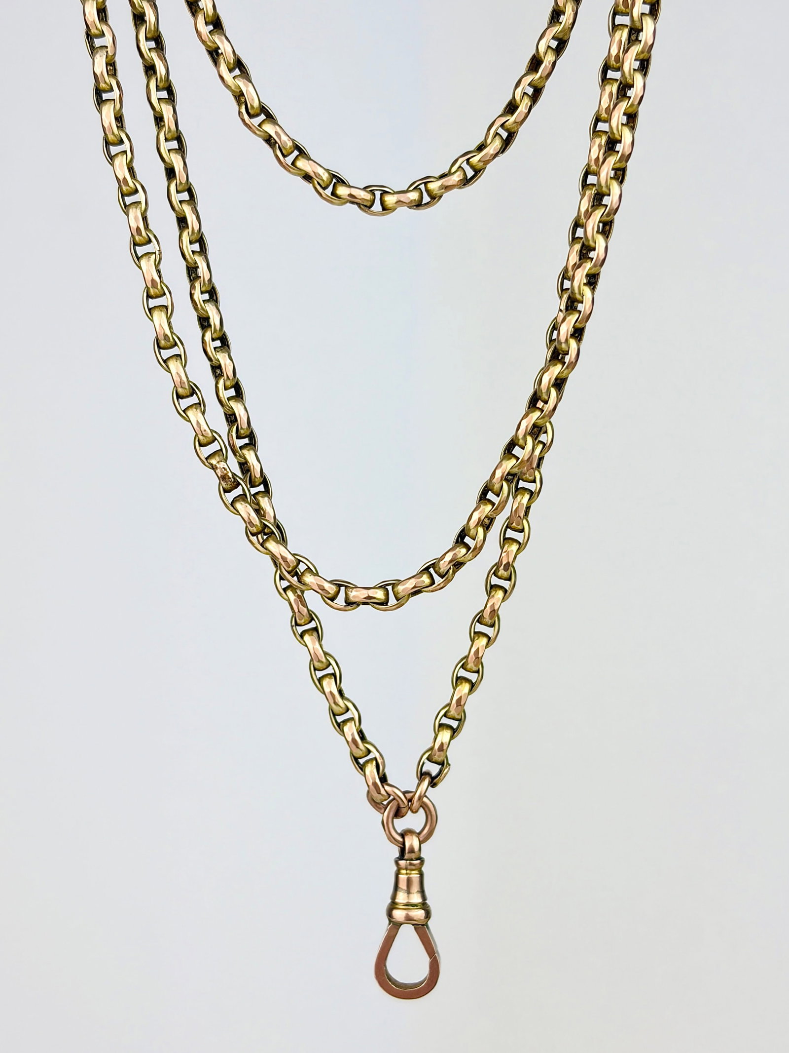 ANTIQUE 9CT GOLD LONGGUARD CHAIN NECKLACE WITH DOGCLIP: ANTIQUE 9CT GOLD LONGGUARD CHAIN NECKLACE WITH DOGCLIP Beautiful chain that can be worn in so many ways! It is long enough to be doubled and even tripled!