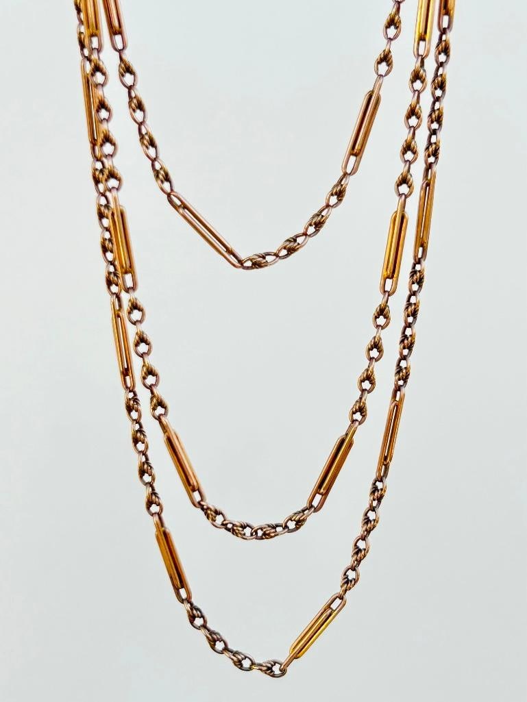 *Heavy Unusual Link 9ct Gold Longguard Chain Necklace with DogClip: Heavy Unusual Link 9ct Gold Longguard Chain Necklace with DogClip gorgeous chain, can wear multiple ways measurements length 148cm width 2mm weight 37.83g 