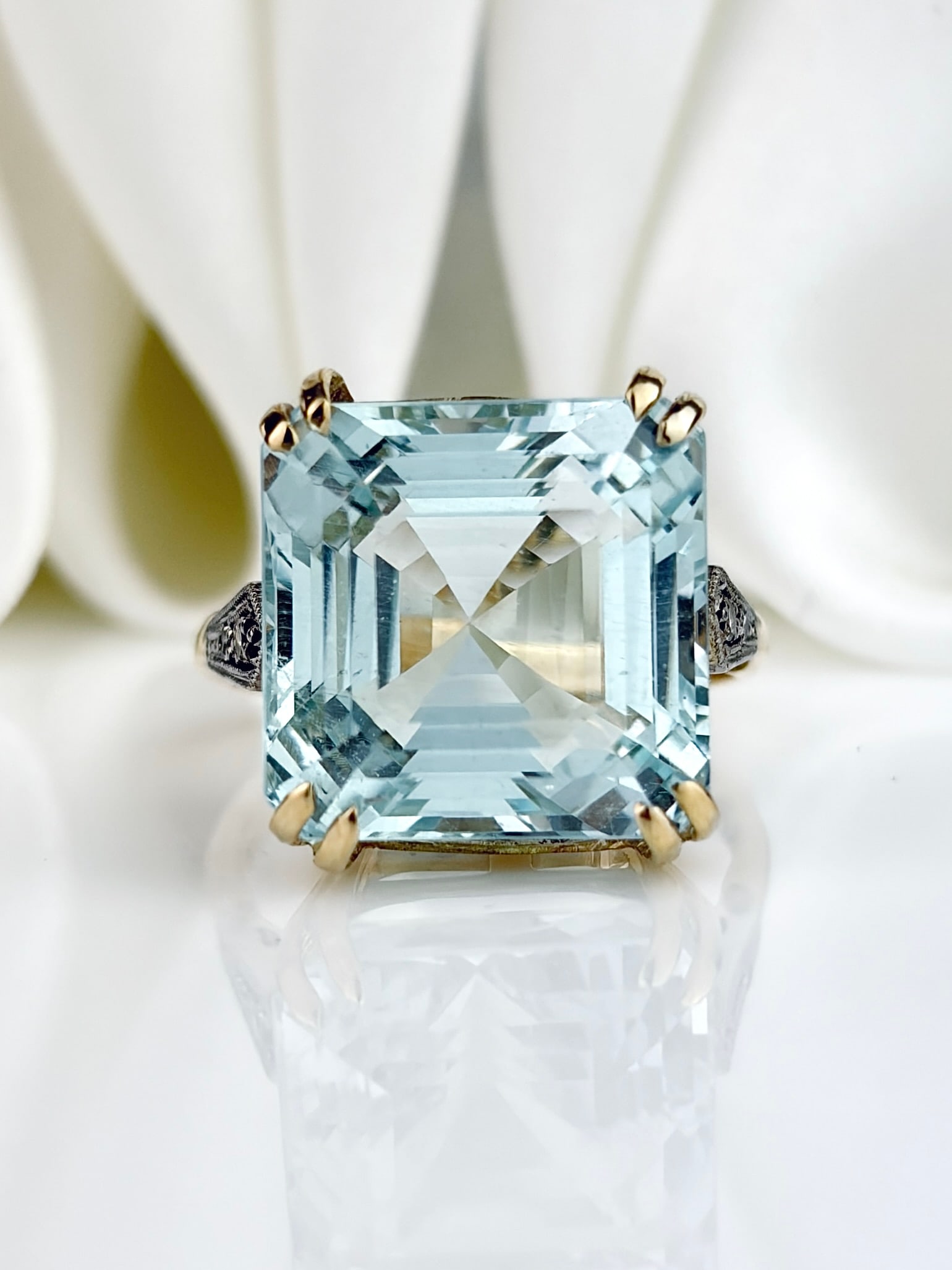 Huge Aquamarine Cocktail Ring with Diamond Shoulders in 9ct Gold and Platinum: Huge Aquamarine Cocktail Ring with Diamond Shoulders in 9ct Gold and Platinum A stunning ring that you won't be able to take your eyes off of!
