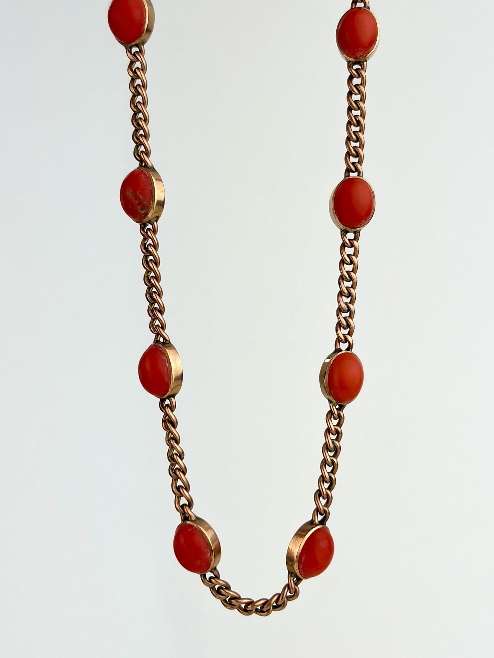9ct Yellow Gold Curb Link Chain with Spaced Coral Stones: 9ct Yellow Gold Curb Link Chain with Spaced Coral Stones Pretty coral links!
