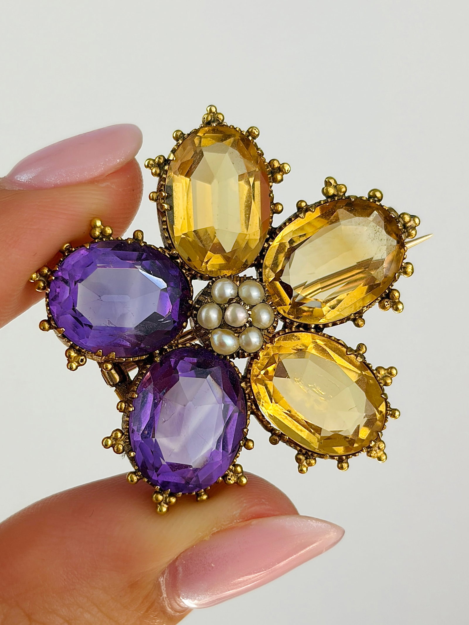 Georgian Era Amethyst and Citrine Large Flower Brooch in Gold: Georgian era amethyst and citrine large flower brooch in gold with hair locket in back