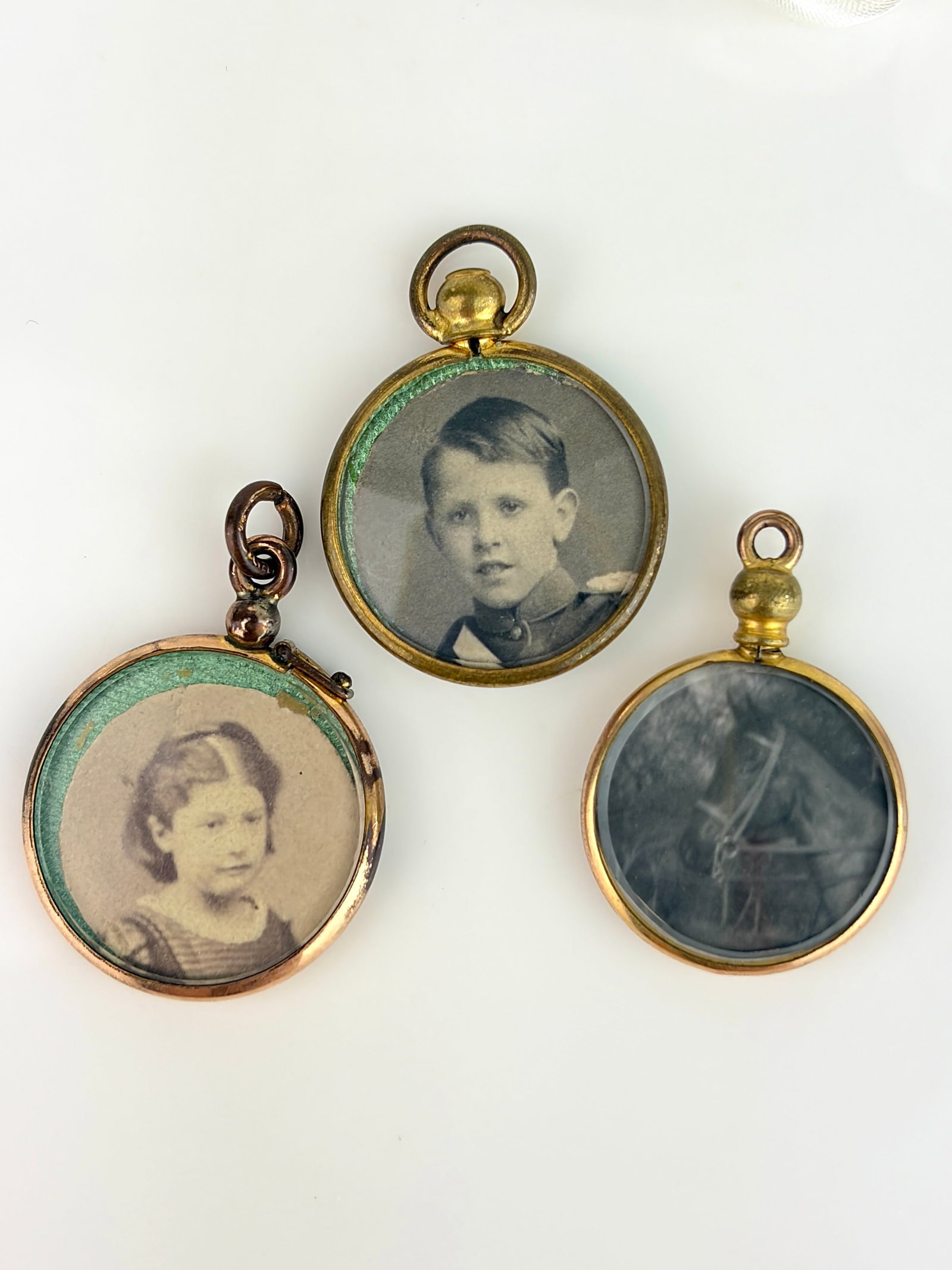 Mixed Lot - 3x Locket Pendants: Mixed Lot - 3x Locket Pendants 29x22mm boy and girl, horse is 29x20mm Combined weight 10.22g
