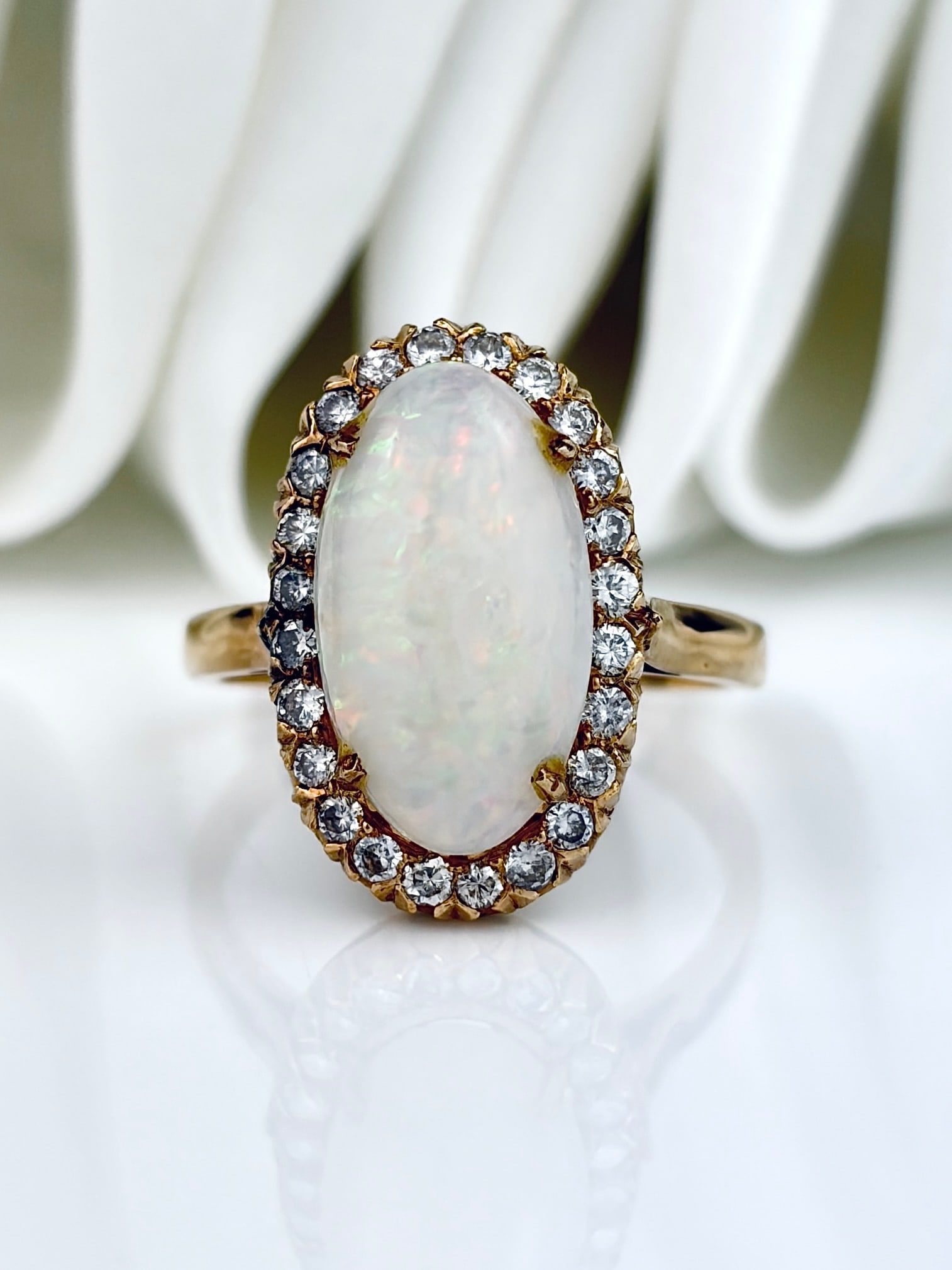 Vintage 18ct Yellow Gold Large Opal and Diamond Halo Cluster Ring: Vintage 18ct Yellow Gold Large Opal and Diamond Halo Cluster Ring Has a beautiful openwork setting on the butt of the ring!
