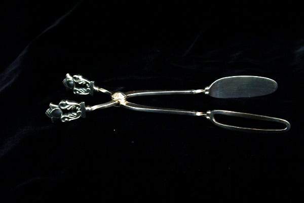 G Jensen "Acorn" Sterling Silver Tongs: G Jensen "Acorn" Sterling Silver Tongs Designed by Johan Rohde, one arm hallmarked with Georg Jensen oval mark 925, the other hallmarked sterling Denmark. 7"l. 2.64ozt.