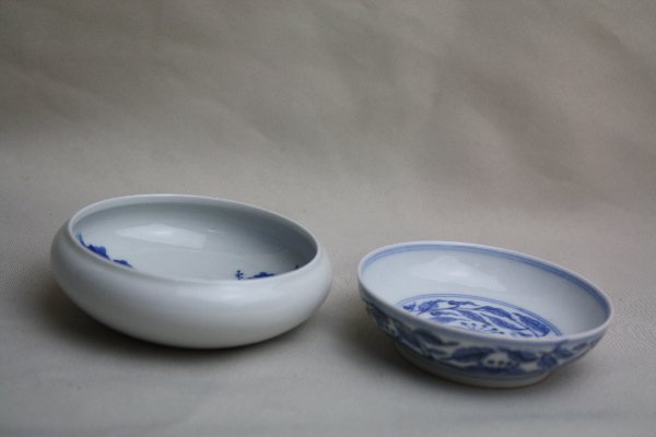 Two Chinese Blue and White Porcelain Item: Piece one is Chinese blue and white porcelain brush washer with Kangxi mark (H 1.2" x W 3.4"). Piece two is Chinese blue and white porcelain dish with Yongzheng mark (H 1" x W 3.4"). Circa 19-20 centu