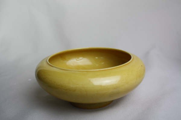 Chinese Yellow Glazed Porcelain Brush Washer: A Chinese yellow glazed porcelain brush washer with Kangxi mark. Circa 19-20 century. 2.2" x 5.4".