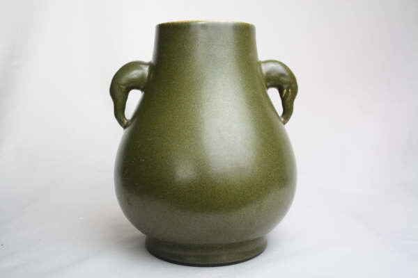 Chinese Tea-Dust Glazed Jar: Chinese Tea-Dust elephant handle glazed porcelain jar with Qianlong mark. Circa 19-20 century. 7" x 5.4".