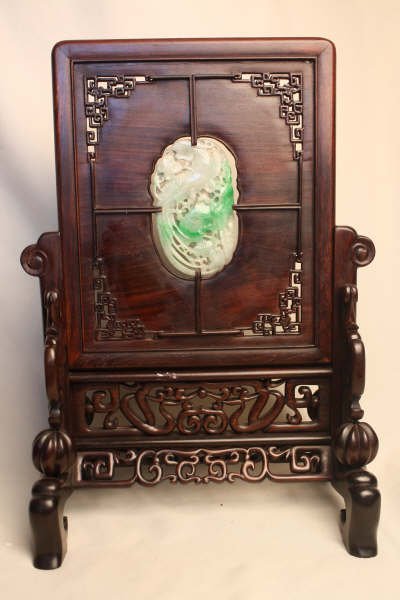 Chinese Carved Jadeite Table Screen: Chinese carved jadeite bird with red sandalwood table screen. 14.5" x 9.7".