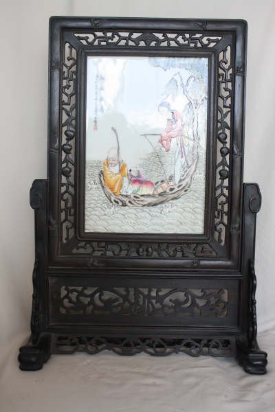 Chinese Famille Rose Porcelain Plaque Table Scree: A Chinese famille rose porcelain plaque table screen, decorated longvity immortal riding a boat. 27" x 18".