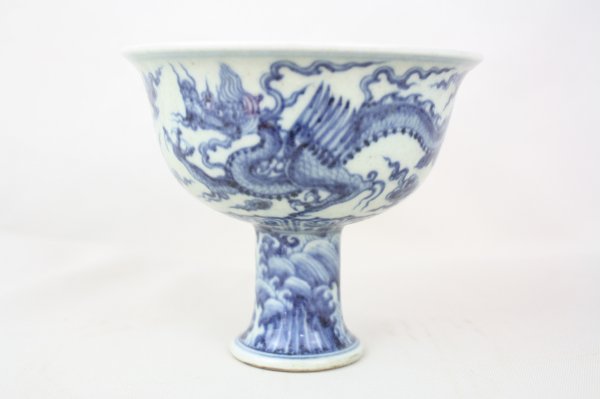 Chinese Blue and White Porcelain Stem Bowl: A Chinese blue and white Porcelain Stem Bowl, decorate with dragon. Xuande mark. Circa 19-20 century. H 4.1" x W 4.6"
