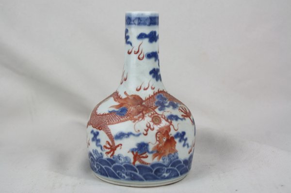 Chinese Iron-red and Blue Porcelain Bottle Vase: A Chinese iron-red and blue porcelain vase, decorated with dragon. Jiaqing mark. Circa 19-20 century. H 6" x W 4".