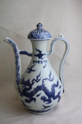 Chinese Blue and White Porcelain Ewer: A Chinese blue and white porcelain ewer, decorate with dragon. Xuande mark. Circa 19-20 century. H 9.2" x W 7".