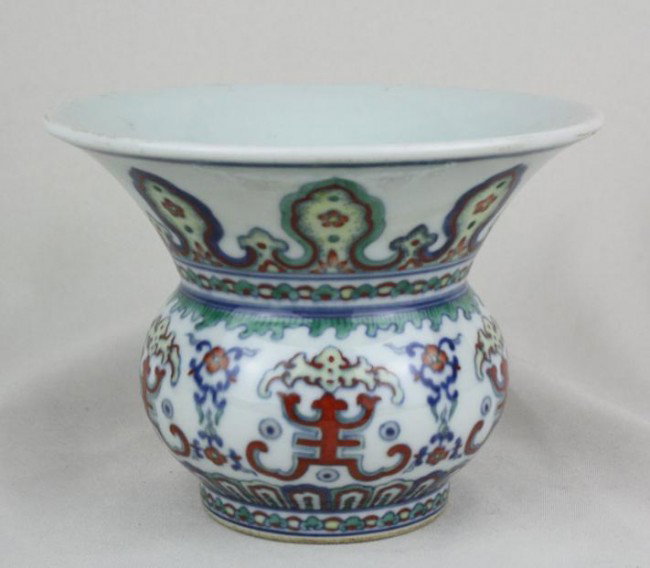 Chinese Doucai Porcelain Spittoon: Chinese Doucai porcelain spittoon with Qianlong mark. 4" x 5".