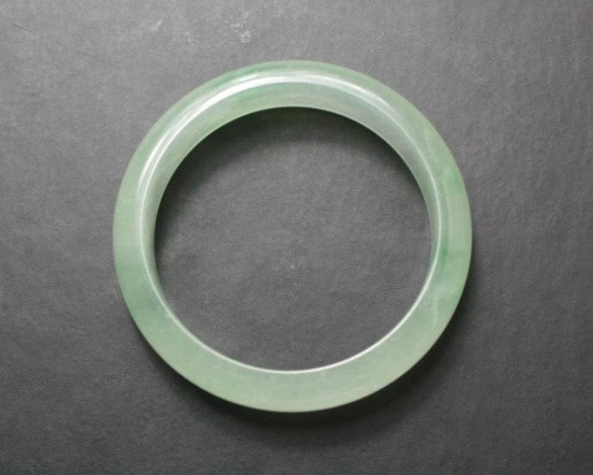 A Very Fine White Jade Bangle Bracelet: A very fine white jade bangle bracelet. 2.7".