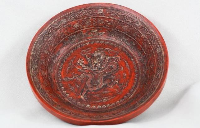 Chinese Tie Sha Ink Dragon Dish: Chinese carved tie sha ink dragon dish with seal Qianlong mark. 1.6" x 6.2".