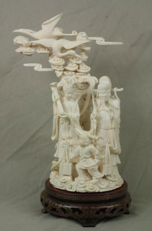 Chinese Carved Ivory Figure: Chinese carved ivory figure, well carved featuring a beauty standing long tiered robes with brocade borders, her right arm handling a ruyi Scepter, another featuring a scholar with a backpack, last wi