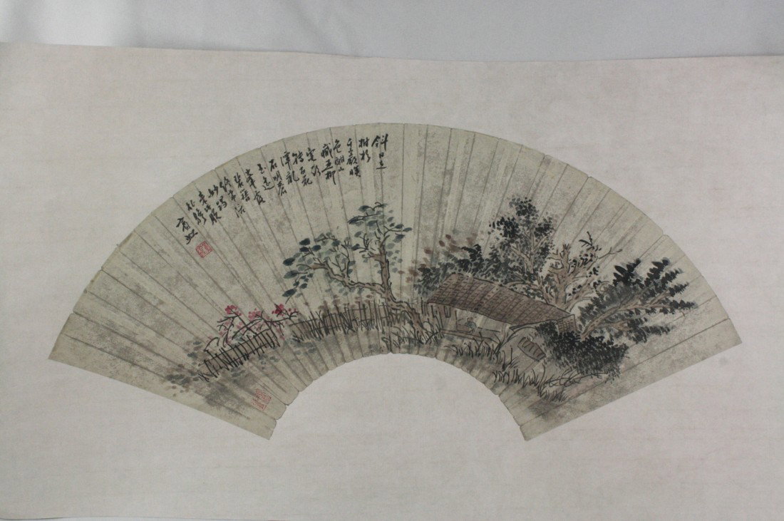 Chinese Fan Painting: Chinese fan shape painting, ink and color on paper, 20th century, featuring a building with trees, the top with a short colophon and signature, with one seal. 9" x 21".