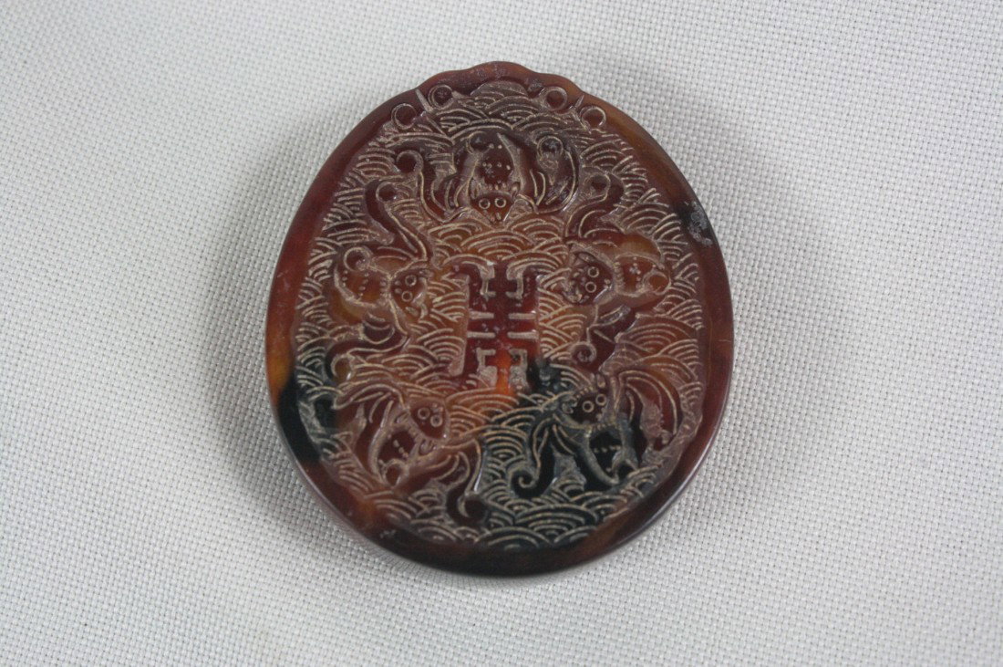 Chinese Archaistic Horn Pendant: Chinese archaistic horn pendant, decorated with bats.1.6" x 1.4".