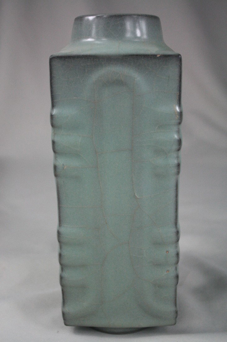 Chinese Ge-type Porcelain Cong: A Chinese ge-type porcelain cong shape vase of archaic jade form, the square sides with projecting verticalflanges all rising to a narrow neck. 9.4" x 3.3".