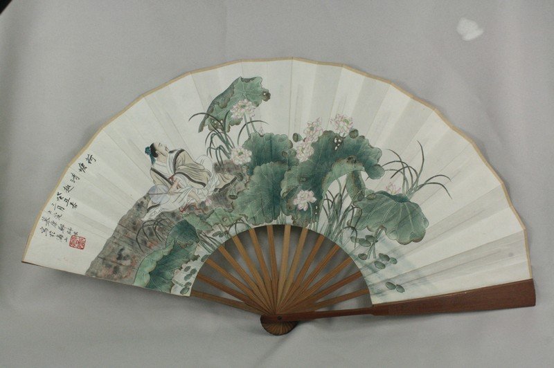 Chinese Fan Painting: Chinese fan painting, ink and color on paper, 20th century, portraying a men sitting beside beautiful lotus floral, the top left with a short colophon and signature, with one seal; the reverse with a 