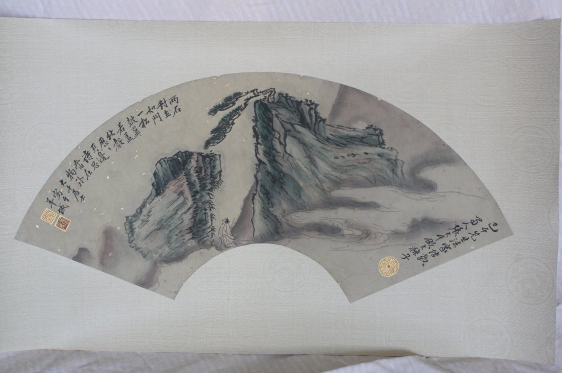 Chinese Fan Painting: Chinese fan shape painting, ink and color on paper, 20th century, featuring rivers and mountain landscape , with a short colophon and signature, with three seal. Attribute to Zhang Daqian (1899-1983).