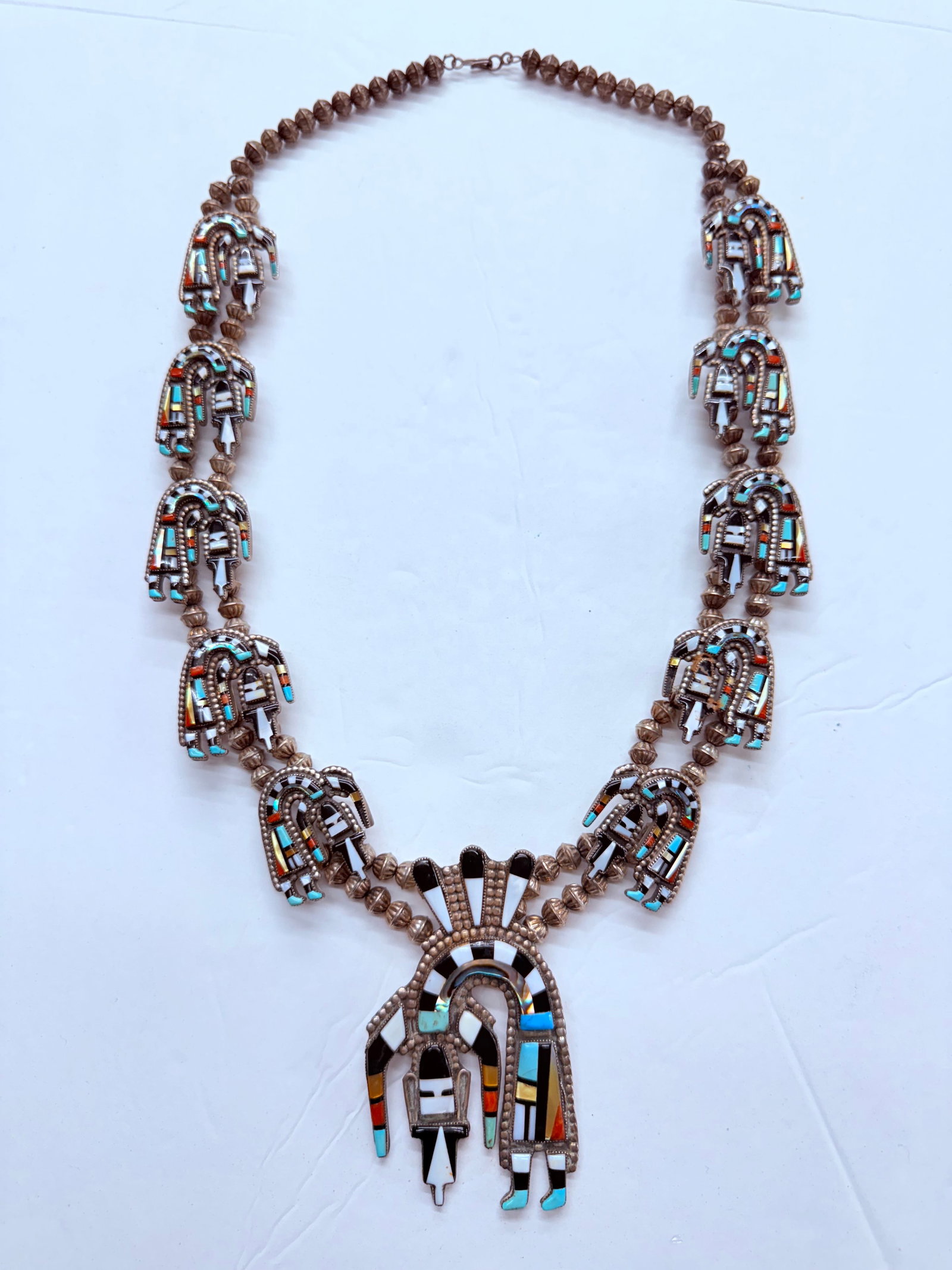 Massive Zuni Rainbow Man Necklace - Vintage Artist Signed A.C.: Sterling silver - massive size and length Drop length 17.5". 11 total rainbow men. Lower main rainbow man approximately 4" in length. Age Patina - Great condition