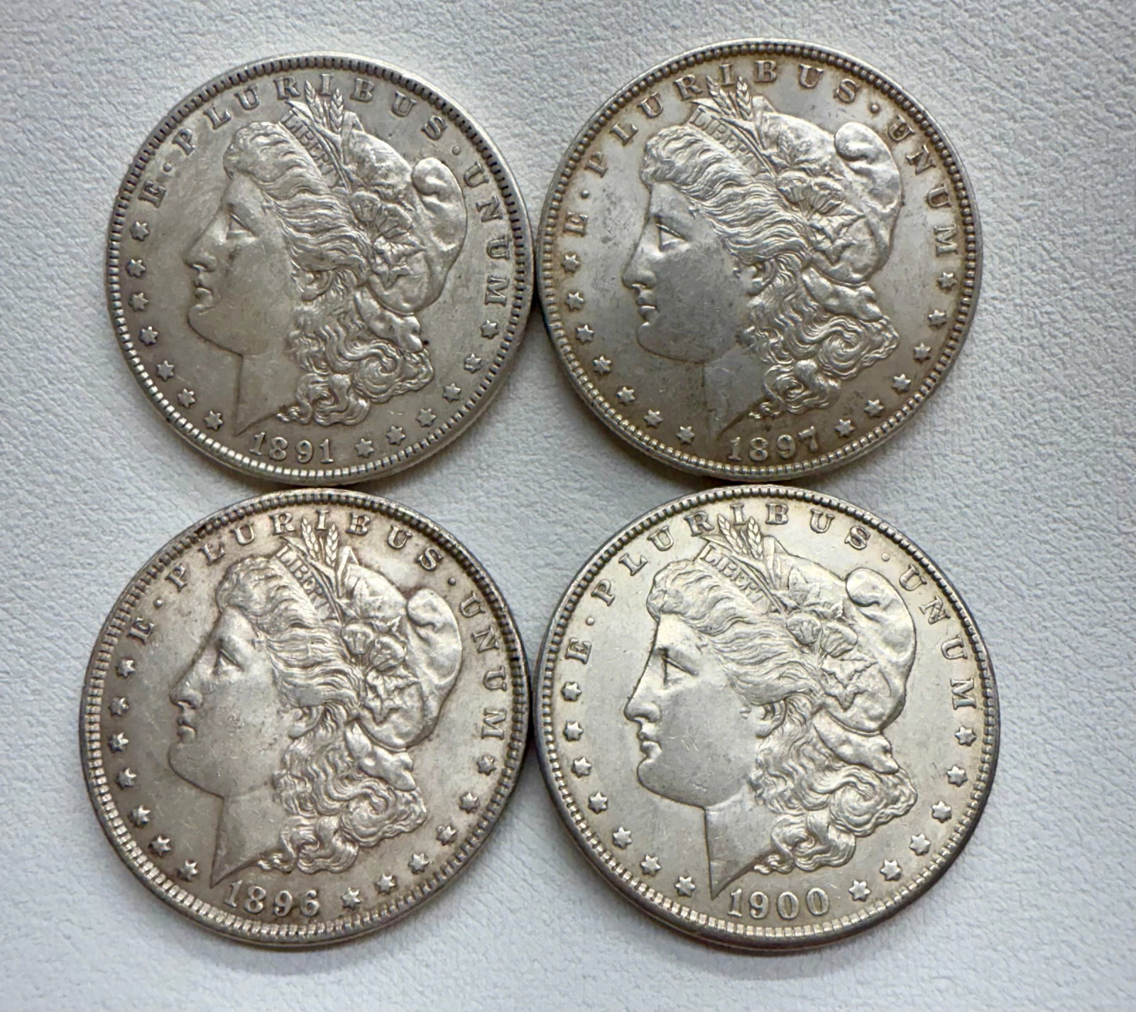 4 Morgan Silver Dollars: 1900 1896 1897 1891 pictures show condition
