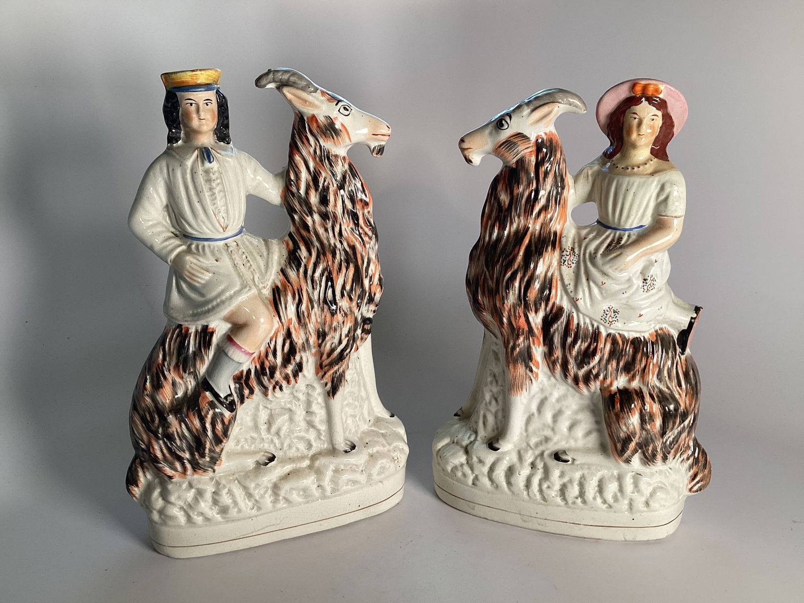 Pair Large English Staffordshire Figures of a Couple on Goats (1 of 3)