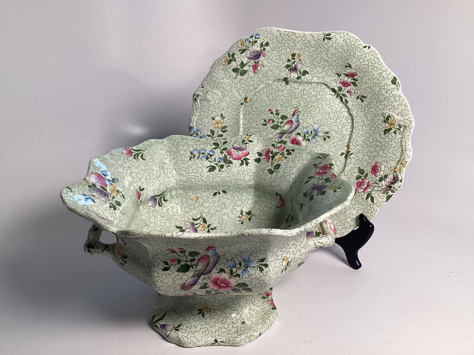 English Staffordshire Whieldon Ware WESSEX Two Handle Center Piece on Stand: Modest edgewear. Overall green transfer decoration with polychrome flowers and bird. Tray is 10.5" wide.