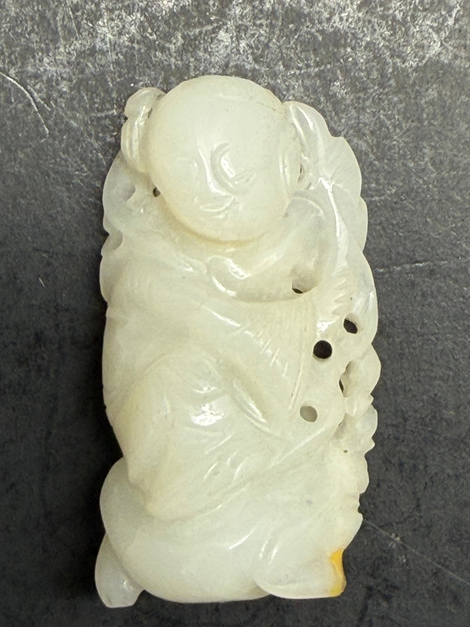 Chinese Qing Dynasty White Nephrite Jade carving of a boy figure 19th Century: This Nephrite Jade Carving would be a great addition to anyones collection. 2" tall by 1" wide by 5/8ths '' thick