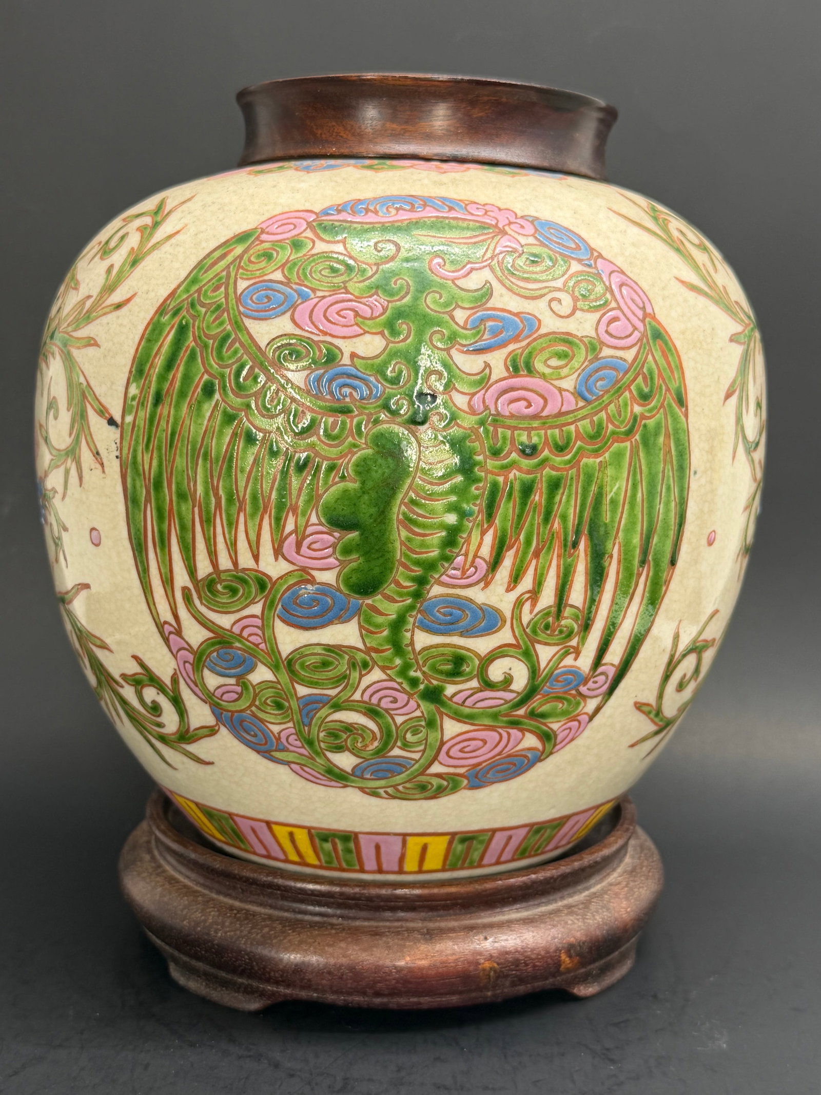 Chinese Qing Dynasty Doucai Porcelain Ginger jar with green phoenix 19th century: Beautiful and large 19th century Qing Dynasty, Guay floral porcelain Ginger Jar with a large phoenix, includes lid and stand. 10" tall by 8" wide. 8" tall without stand or lid.