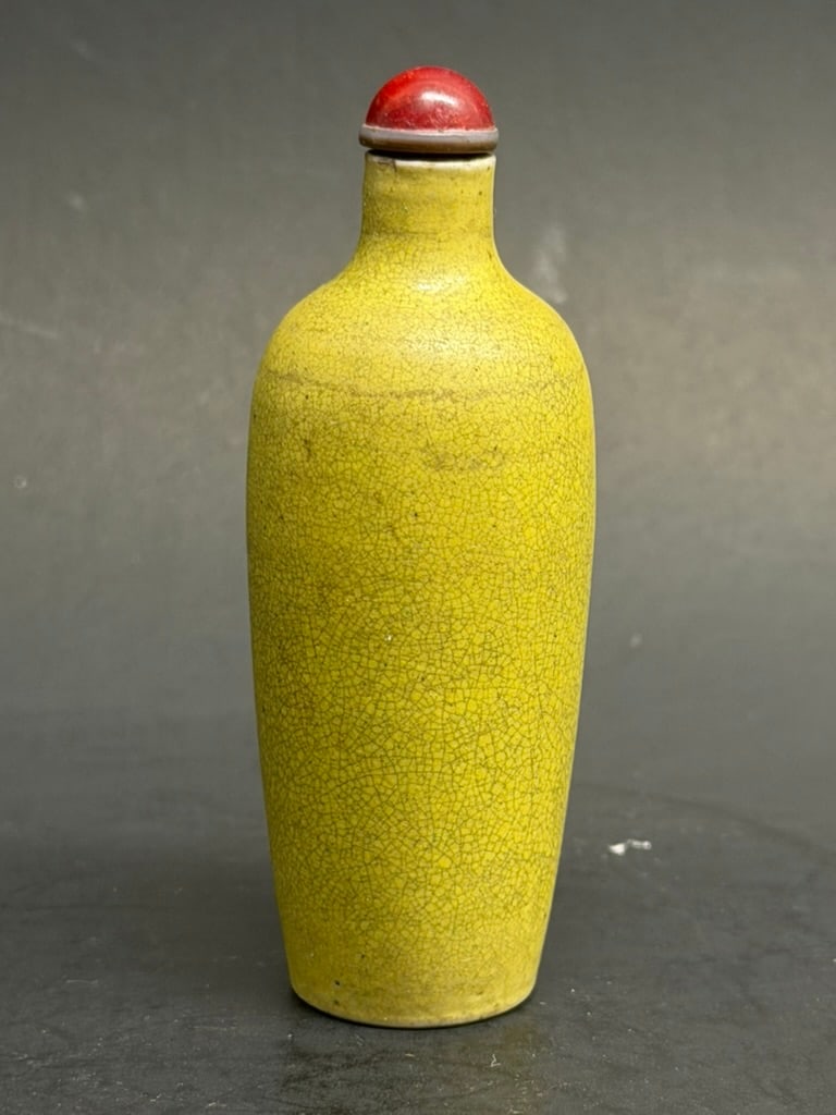 Chinese 19th Century Olive Green Monochrome Porcelain Snuff Bottle with horn and red painted stopper: Chinese 19th Century Olive Green Monochrome Porcelain Snuff Bottle with horn and red painted stopper 2 3/4'' tall by 1" wide