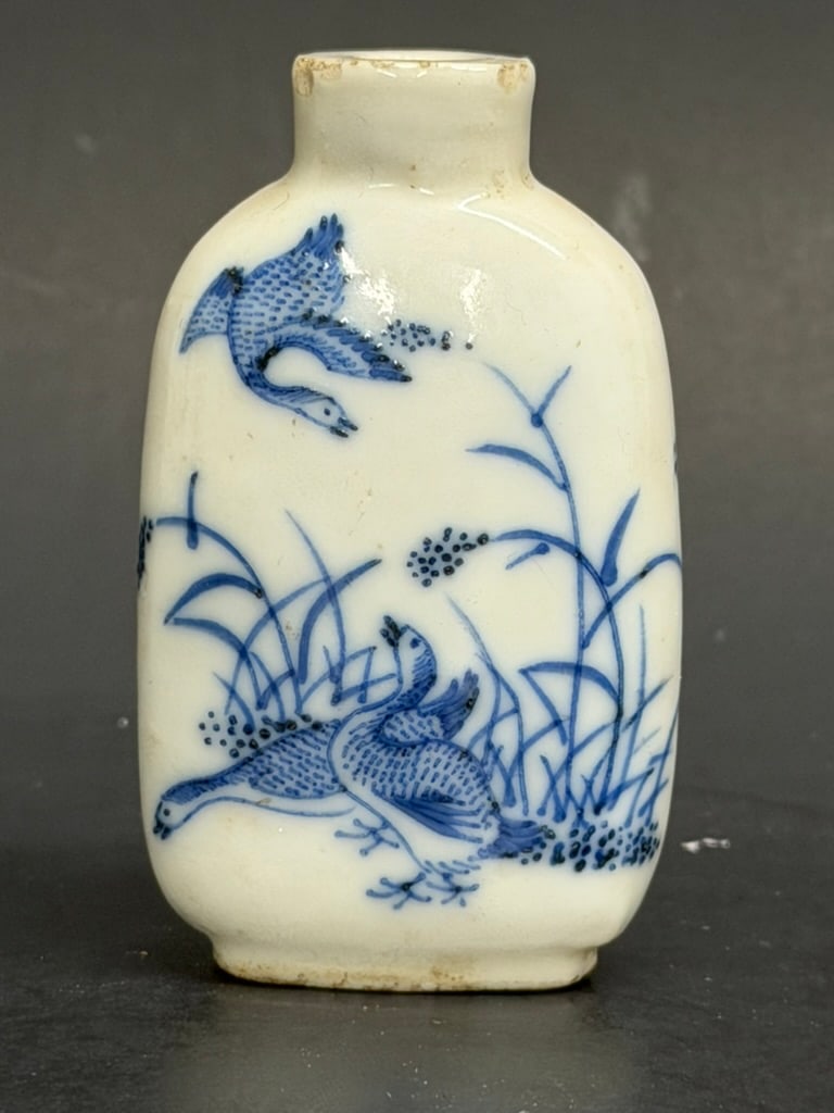 Chinese Qing Dynasty blue and white snuff bottle With Geese in Reeds: Chinese 19th Century blue and white snuff bottle With Geese in Reeds. No stopper. 2 1/4'' tall by 1 1/2'' by 3/4"