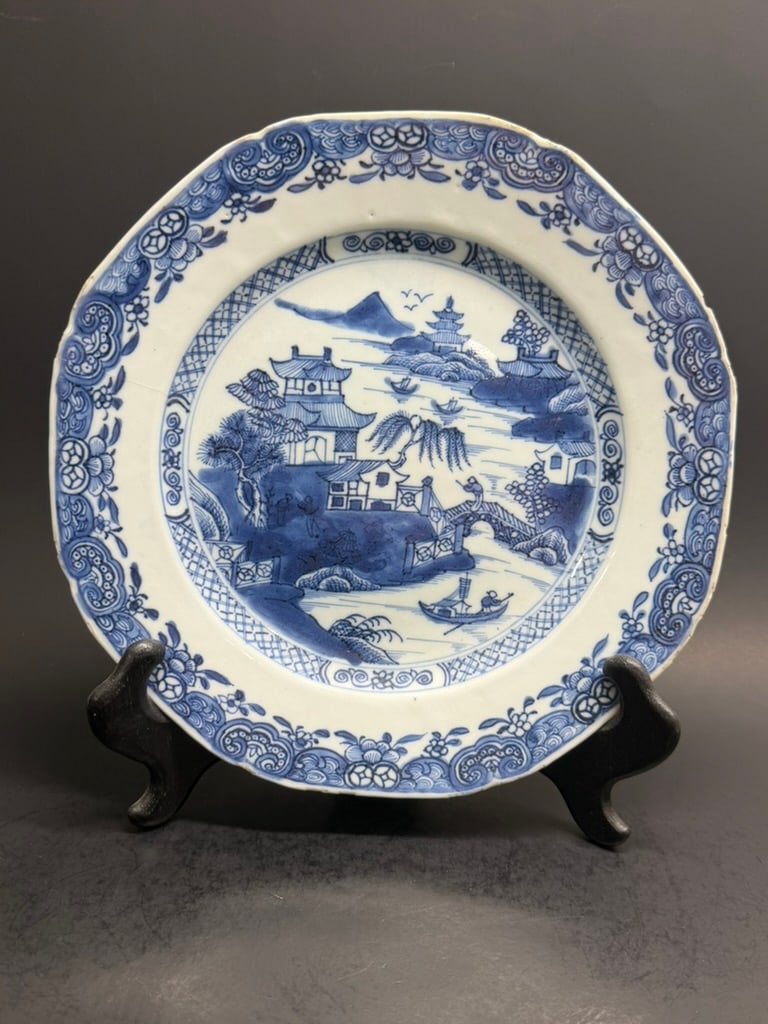 Chinese Qianlong Early 18th century Octagonal blue and white porcelain plate.: Early 18th century Octagonal Chinese Qianlong blue and white porcelain plate, the dish decorated with the river and landscape 9"